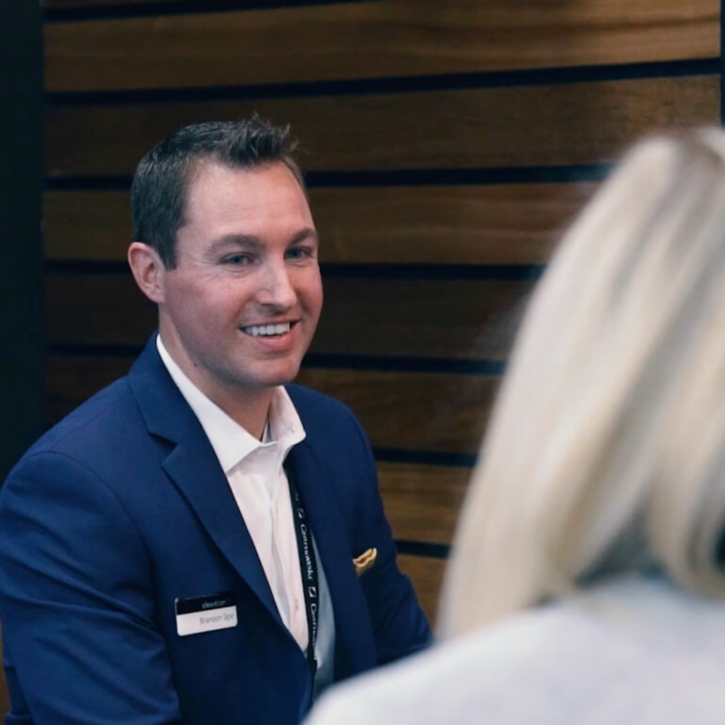 Expert Staff Engaging with a Prospect at Trade Show